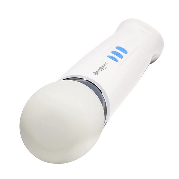 Product shot on a white background of the Hitachi Magic Wand Mini personal massager laying on its side showing a closeup of its massage head in the foreground.